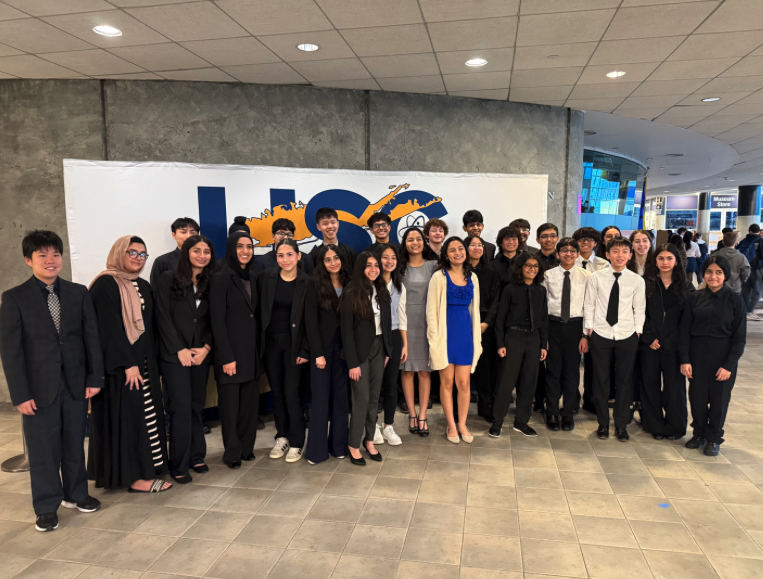 “I think the competitions were a great opportunity for students to present their research and for them to communicate their findings in a professional setting,” science research teacher Mr. Denara said. (Source by Mr. Denara) 